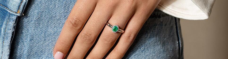 Engagement rings with emerald and diamond