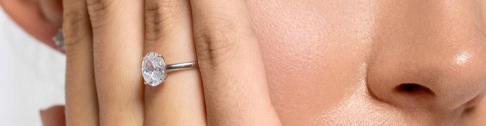 Engagement rings with diamond and coloured stone