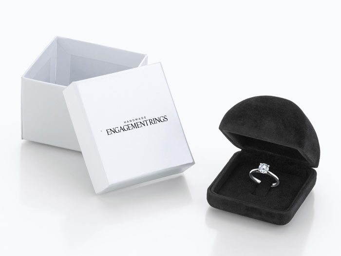 Stylishly packaged engagement ring in a black jewelry case