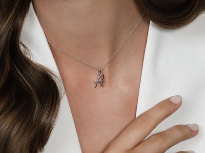 Letter pendant Dalí