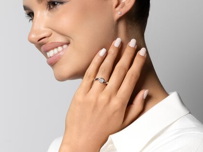 Engagement ring Twist in 18K rosé gold with diamond 0.40ct G/SI