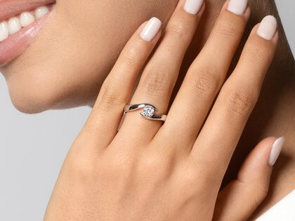 Engagement ring Twist in 18K rosé gold with diamond 0.40ct G/SI