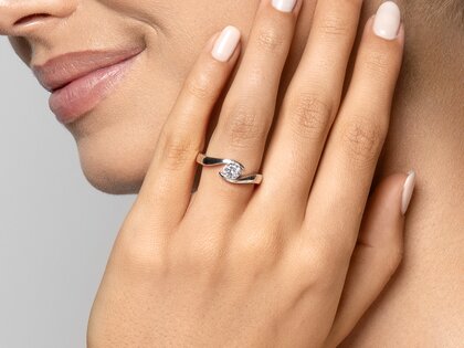 Engagement ring Twist in platinum 950/- with diamond 0.50ct G/SI